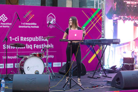 Baku, Azerbaijan â June 08, 2019 â Woman singer performing on the stageのeditorial素材