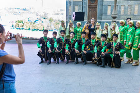 Baku, Azerbaijan â€“ June 08, 2019 â€“ Taking group photo of Azerbaijani national dancers