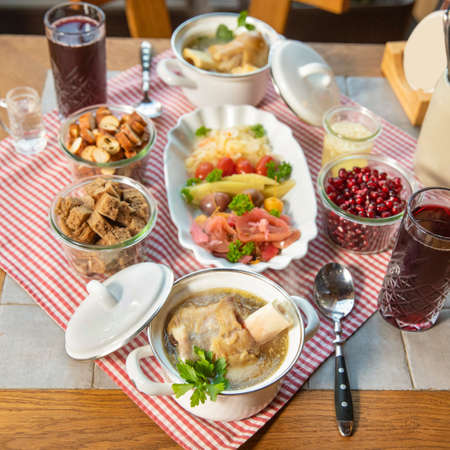 Pomegranate juice with vodka meat meals and snacks, top viewの写真素材