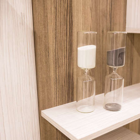 Two glass sand-glass isolated