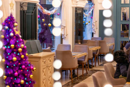 Purple Christmas tree in the restaurant interiorのeditorial素材