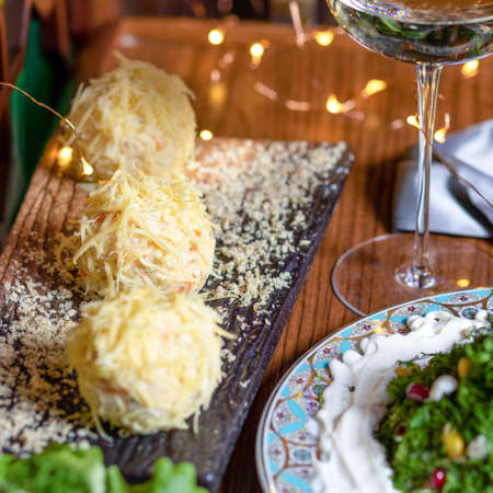 Cheese balls on the table close upの写真素材