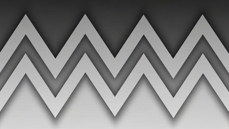 A modern abstract background featuring repeating chevron shapes in shades of gray with soft shadows creating depth and a sense of movementの素材