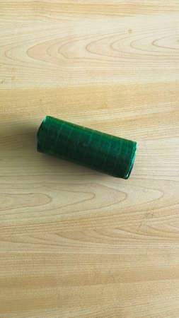 Lemper Ayam, a typical Indonesian snack made from glutinous rice stuffed with seasoned chicken wrapped in banana leaves. usually served when there is an eventの写真素材