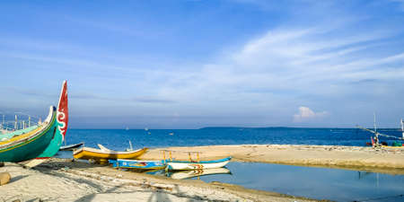 the coast which is usually used by the Gili Raja island community to work as fishermenの写真素材