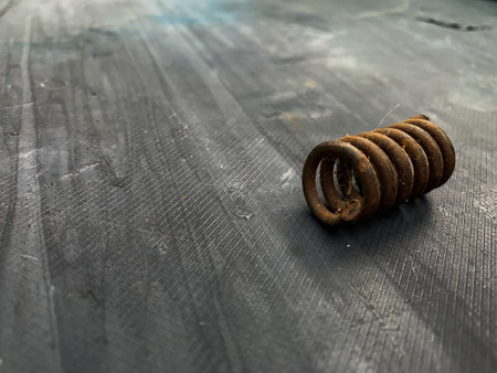 rusty spring iron on gray backgroundの写真素材