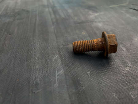 rusty bolts on a gray backgroundの写真素材