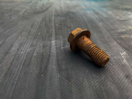 rusty bolts on a gray background