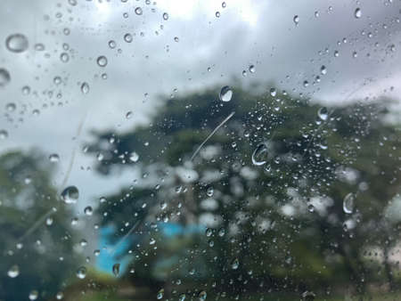 raindrops visible from inside the carの写真素材
