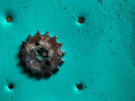 the rusty gear is left on the tableの写真素材