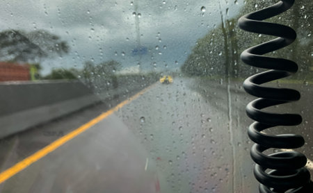 raindrops visible from inside the carの写真素材
