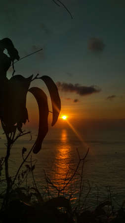 sunset on the beach makes a beautiful silhouette