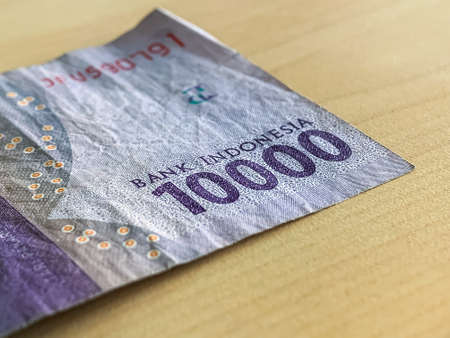 Close Beautiful rupiah money background. Indonesian, Indonesian Rupiah. Ten thousand rupiah banknotes. Macro view.の写真素材