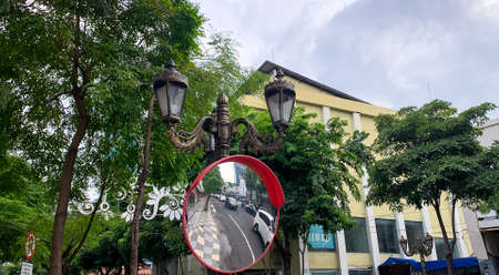 March 12, 2022 - Surabaya, Indonesia. convex mirror on Tunjungan road to make it easier for driversのeditorial素材
