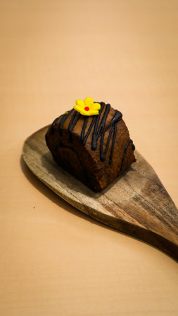 Chocolate cake with yellow flower decoration