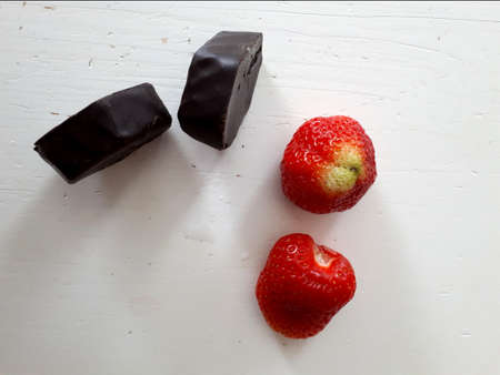 strawberry with chocolate dipping isolated on whiteの写真素材