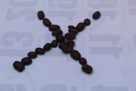 Coffee beans on the background of the financial chart. Close up.