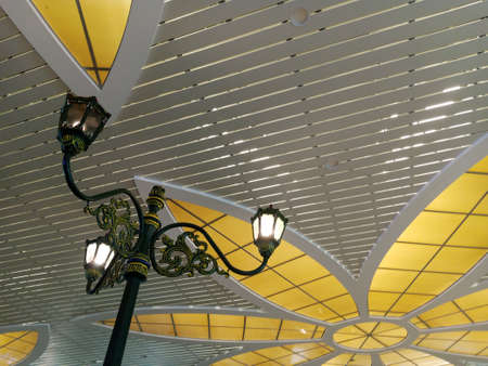 Lamppost in the interior of the train station in Parisの写真素材