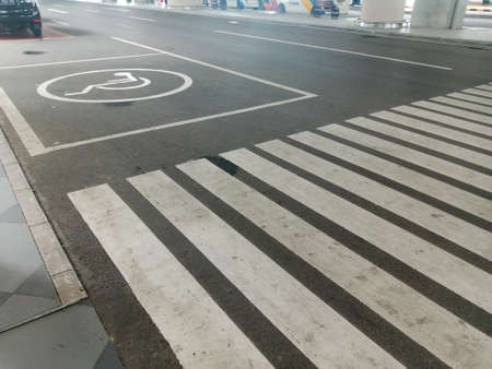 Zebra crossing in the parking lot of the shopping mall in Bangkok, Thailand