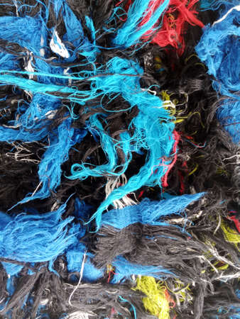 Close up of multicolored woolen fabric as background, top viewの写真素材