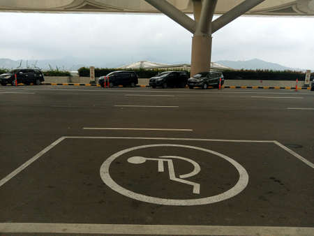 Parking space for cars in the parking lot at the airportの写真素材