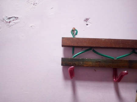 Wooden shelf on a white wall. The concept of construction and repair.の写真素材