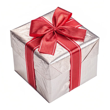 Silver gift box with red ribbon bow isolated on white background, clipping path includedの素材