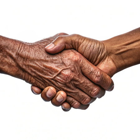 Two hands of old and young people shaking hands isolated on white backgroundの素材