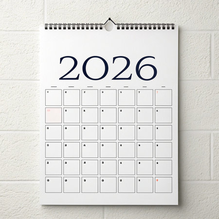 Calendar on wall in office. Calendar for 2016 on white wall backgroundの素材