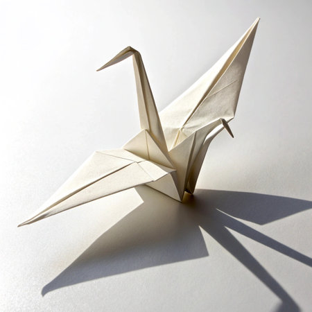 Paper origami crane on a white background. Paper origami craneの素材