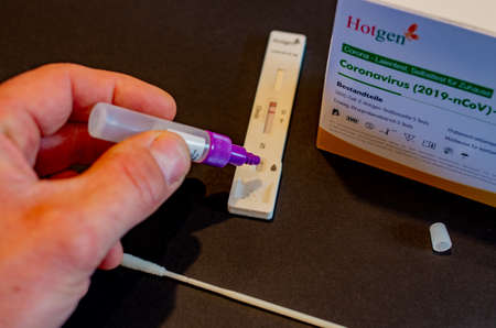 BAMBERG, GERMANY - 8.4.2021. Covid-19 antigen test Kit for a rapid covid check from Hotgen in front...