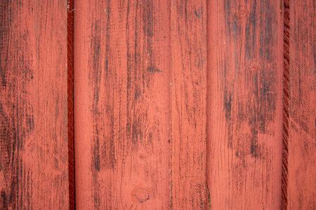 Red wooden wall backgroundの写真素材