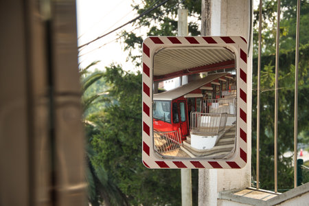 Mount Artxanda Funicular reflected in a mirror of the station, which has served to bring the people of Bilbao closer to one of the mountains surrounding the city, Mount Artxanda. Transportation concept.の写真素材