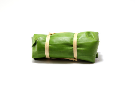 Packaging from banana leaves.For bananas with sticky rice dessert for Thai food.の写真素材