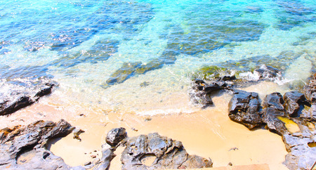 Beach, sea waves and blue sea at Sichang Island, Chonburi, Thailandの写真素材