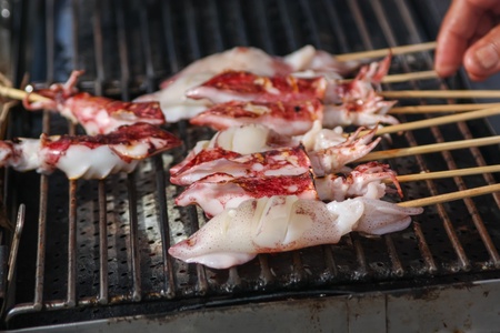 Grilled squid, tasty street food of Thailandの写真素材