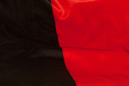 red-black Ukrainian flag as backgroundの写真素材