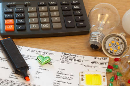 calculator and set for electricity saving on LEDsの写真素材