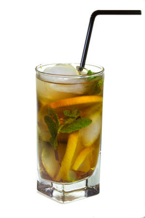 Drops of rose on a glass of cold drink with ice, lemon and mint on a white backgroundの写真素材