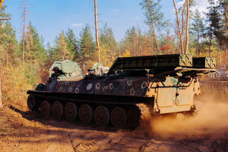 real battle tanks disguised in the trenches Donbass Ukraineの写真素材
