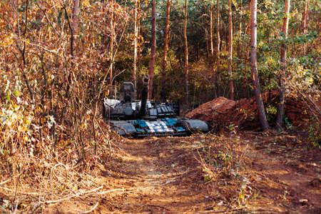 real battle tanks disguised in the trenches Donbass Ukraineの写真素材