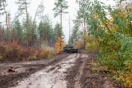 real battle tanks disguised in the trenches Donbass Ukraineの写真素材