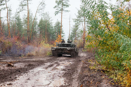 real battle tanks disguised in the trenches Donbass Ukraineの写真素材