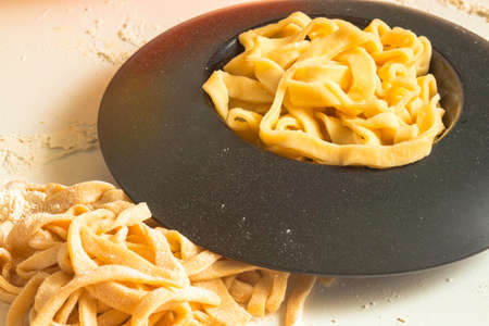 home cooking - making italian pasta from doughの写真素材