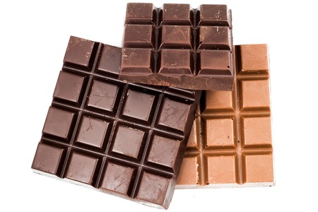 Natural black and milky chocolate bars isolated on white background, top viewの写真素材