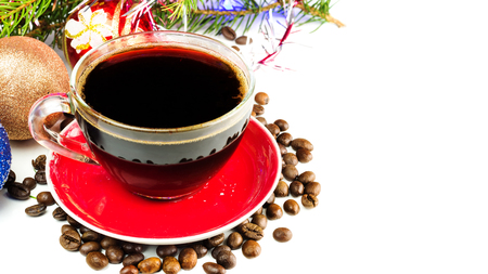 Xmas still life, cup of black coffee, beans, chocolate, christmas tree and balls with copy spaceの写真素材