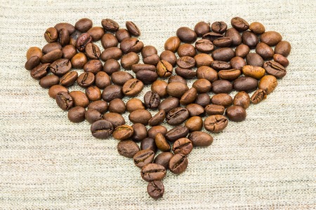 Roasted coffee beans in shape of heart