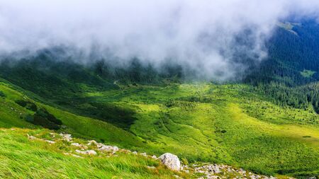 View from the top of Carpathian mountains, above the clouds. Chornogora ridge