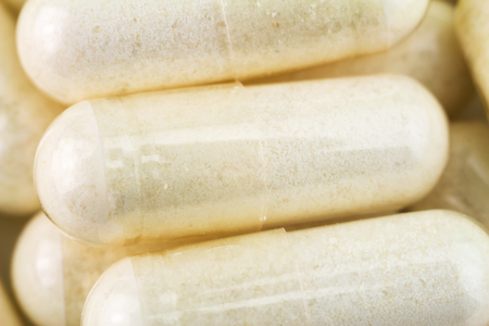 Natural food supplement pills, glucosamine capsules, macro imageの写真素材