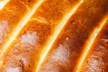 Hot, fresh golden brown baked homemade sweet pies, strudelの写真素材